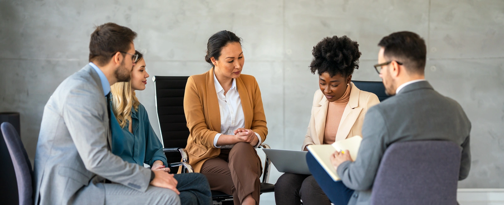 Senior living team meeting to discuss resident care and family support