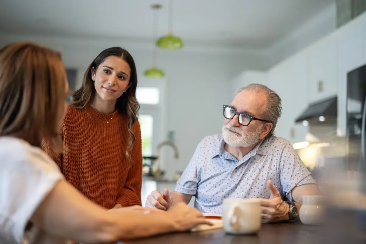 Daughter spending time at home with senior parents when a parent refuses assisted living